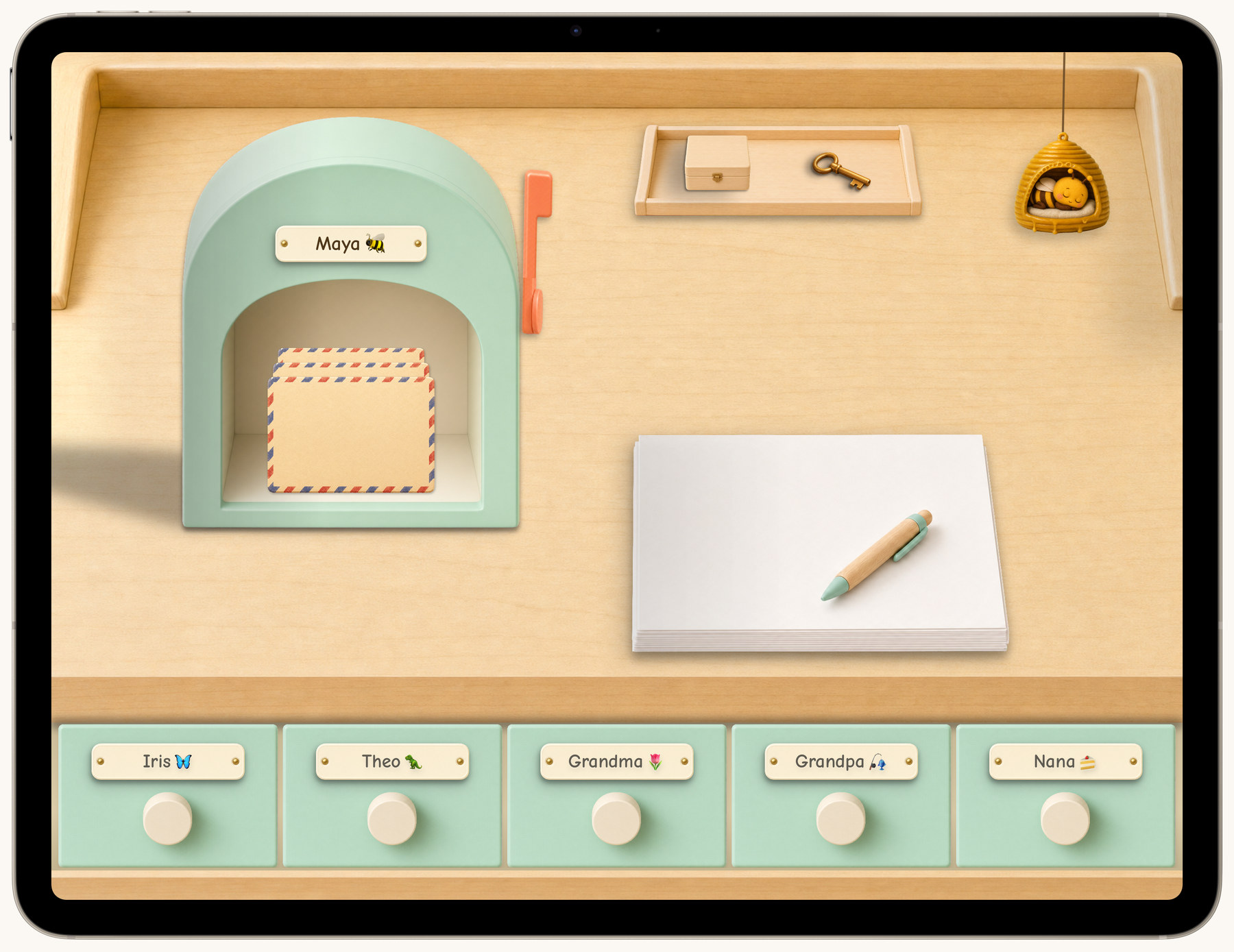 Buzzybox running on an iPad Air — a mailbox with mail waiting, a stack of paper and pen, and a row of named drawers