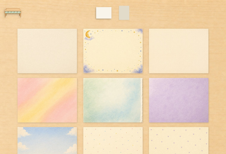 A grid of letter papers to choose from — plain cream, a moonlit sky, a rainbow wash and a green-blue wash